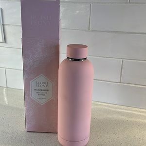 Blush Peony Wanderlust insulated water bottle.